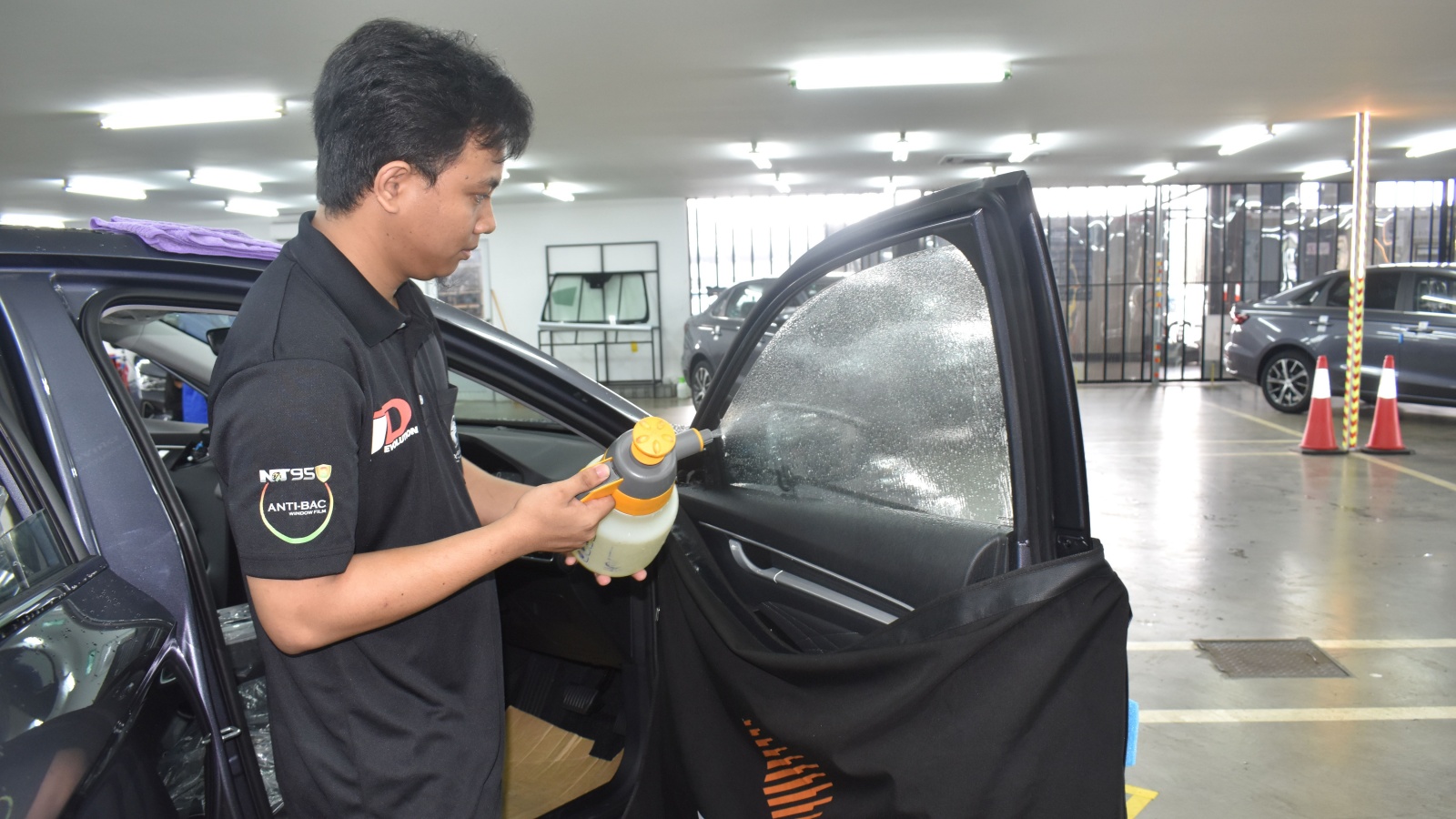 To avoid fried electronics, Proton now has its own window tint installation centre